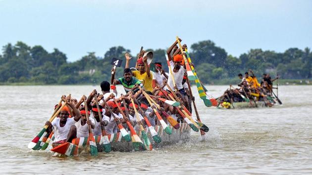 Oarsmen row their boats during the annual boat race festival at Rudra Sagar Lake in Melaghar, 55 kms south-east of Agartala, Tripura. (PTI) Oarsmen row their boats during the annual boat race festival at Rudra Sagar Lake in Melaghar, 55 kms south-east of Agartala, Tripura. (PTI)