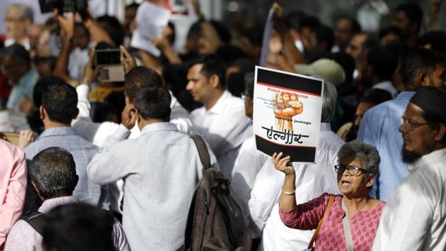 Social groups and organisations "Protest against Fascism" and the arrests at Pune Collectorate on August 30, 2018. The investigation into the Elgar Parishad event on December 31, 2017 is being conducted by the Pune (urban) police. Meanwhile, Pune (rural) police has charged two Hindu right-wing leaders, Milind Ekbote and Shambhaji Bhide, for the Bhima Koregaon violence. Ekbote is currently out on bail while Bhide has not yet been arrested. (Rahul Raut / HT Photo)