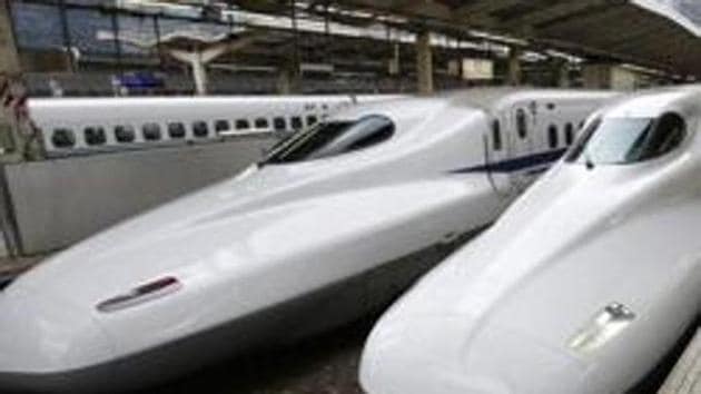 FILE - In this Sept. 24, 2014 filephoto, passengers get on the Shinkansen high-speed train at Tokyo station in Tokyo. (AP) FILE - In this Sept. 24, 2014 filephoto, passengers get on the Shinkansen high-speed train at Tokyo station in Tokyo. (AP)