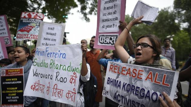 Protesters hold placards and raise slogans during a protest at Parliament Street in New Delhi, on August 30, 2018 against arrests of lawyer and trade union activist Sudha Bhardwaj, poet P Varavara Rao, activist Gautam Navlakha, and lawyers Arun Pereira and Vernon Gonsalves across five states by Pune Police on Tuesday. (Burhaan Kinu / HT Photo)