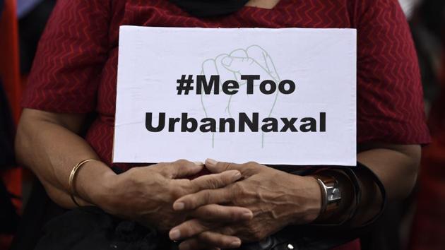 A demonstrator holds a placard during a protest against arrests of civil and democratic rights activists by the Maharashtra Police, at Parliament Street, in New Delhi. (Burhaan Kinu / HT Photo) A demonstrator holds a placard during a protest against arrests of civil and democratic rights activists by the Maharashtra Police, at Parliament Street, in New Delhi. (Burhaan Kinu / HT Photo)