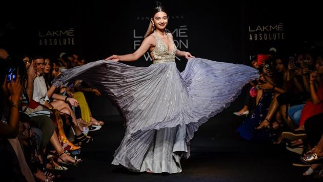 Bollywood actor Radhika Apte showcases a creation by designer Punit Balana at the Lakmé Fashion Week Winter/Festive, in Mumbai, Maharashtra. (PTI) Bollywood actor Radhika Apte showcases a creation by designer Punit Balana at the Lakmé Fashion Week Winter/Festive, in Mumbai, Maharashtra. (PTI)