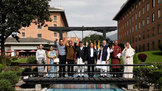 (L to R) Myanmars first lady Cho Cho, Nepal’s first lady Radhika Shakya, Thailand’s Prime Minister Prayut Chan-O-Cha, Sri Lanka’s President Maithripala Sirisena, Nepal’s Prime Minister Khadga Prasad Sharma Oli, Myanmar President Win Myint, India’s Prime Minister Narendra Modi, Bhutan’s chief justice Dasho Tshering Wangchuk and Bangladesh’s Prime Minister Sheikh Hasina pose for a group photo during the Bay of Bengal Initiative for Multi-Sectoral Technical and Economic Cooperation (BIMSTEC) summit in Kathmandu, Nepal. (Navesh Chitrakar / Pool / AFP) (L to R) Myanmars first lady Cho Cho, Nepal’s first lady Radhika Shakya, Thailand’s Prime Minister Prayut Chan-O-Cha, Sri Lanka’s President Maithripala Sirisena, Nepal’s Prime Minister Khadga Prasad Sharma Oli, Myanmar President Win Myint, India’s Prime Minister Narendra Modi, Bhutan’s chief justice Dasho Tshering Wangchuk and Bangladesh’s Prime Minister Sheikh Hasina pose for a group photo during the Bay of Bengal Initiative for Multi-Sectoral Technical and Economic Cooperation (BIMSTEC) summit in Kathmandu, Nepal. (Navesh Chitrakar / Pool / AFP)