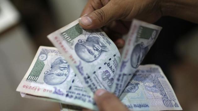 On Thursday, the rupee slid further by 15 paise to close at a fresh lifetime low of 70.74 to the dollar due to strong demand for the greenback from oil importers and surging crude oil prices stoking inflation fears.(Reuters File Photo)