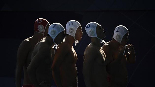 China’s players prepare to compete in their men’s water polo group B match against Hong Kong during the 2018 Asian Games in Jakarta, Indonesia. (Fred Dufour / AFP)