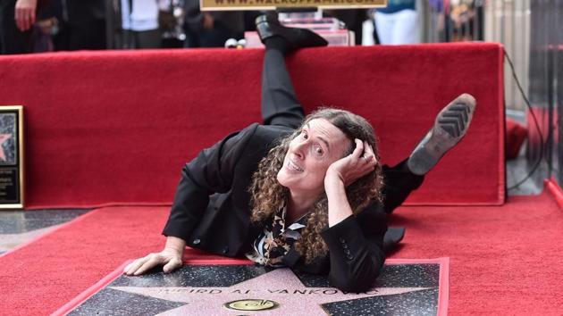 “Weird Al” Yankovic attends a ceremony honouring him with the 2,643rd star on the Hollywood Walk of Fame in Hollywood, California. (Alberto E. Rodriguez / Getty Images / AFP)