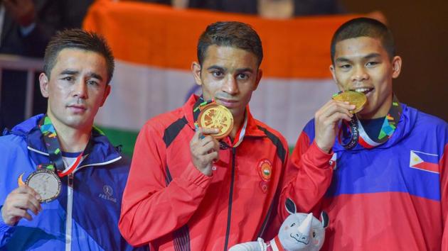 Jakarta: Gold-medallist India's Amit Panghal (C) during the presentation ceremony for Men's light fly (46-49kg) boxing at the 18th Asian Games 2018 in Jakarta, Indonesia on Saturday, Sept 1, 2018.(PTI)