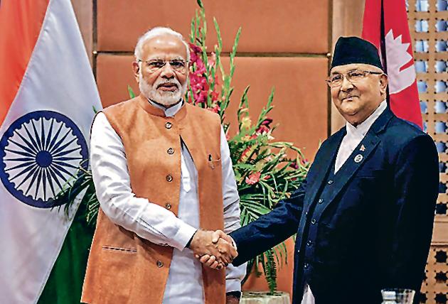 Prime Minister Narendra Modi shakes hands with his counterpart in Nepal, K P Sharma Oli, at a meeting on the sidelines of 4th BIMSTEC Summit in Kathmandu, Nepal, August 31, 2018(PTI)