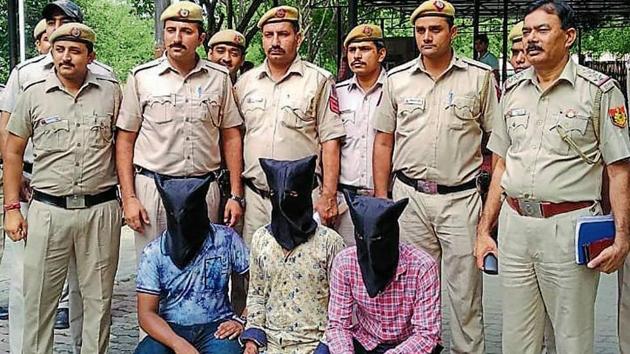 The three arrested men in police custody on Friday. (Sourced) The three arrested men in police custody on Friday. (Sourced)