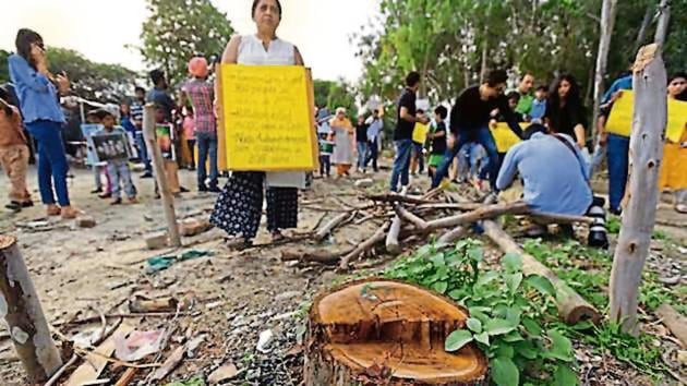 Residents have been protesting against the felling of trees at the city forest in Sector 91, where the park is proposed (HT File Photo) Residents have been protesting against the felling of trees at the city forest in Sector 91, where the park is proposed (HT File Photo)