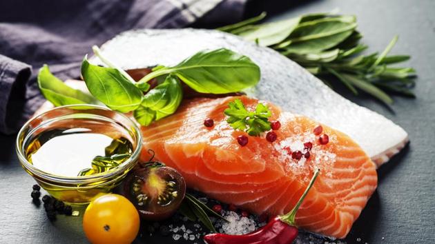 Salmon contains omega-3 fatty acids, which relaxes muscles, and relieves menstrual pain. It also contains anti-inflammatory fats. (Shutterstock) Salmon contains omega-3 fatty acids, which relaxes muscles, and relieves menstrual pain. It also contains anti-inflammatory fats. (Shutterstock)