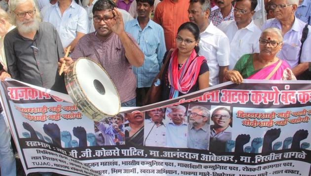 People stage protest to condemn the arrest of activists at Azad Maidan, in Mumbai on September 1. (HT Photo) People stage protest to condemn the arrest of activists at Azad Maidan, in Mumbai on September 1. (HT Photo)