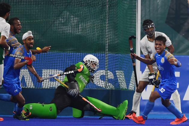 India's players celebrate scoring during the men's field hockey bronze medal match between India and Pakistan. (AFP) India's players celebrate scoring during the men's field hockey bronze medal match between India and Pakistan. (AFP)