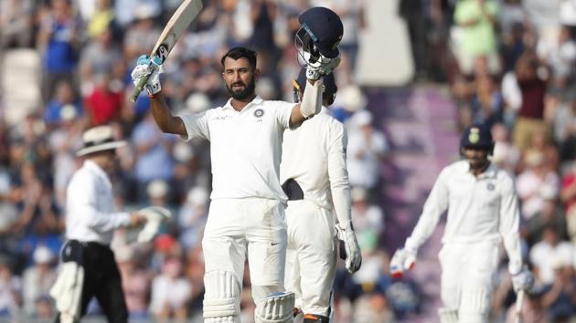 India's Cheteshwar Pujara celebrates getting 100 runs not out during play on the second day of the 4th cricket test match between England and India at the Ageas Bowl in Southampton, England, Friday, Aug. 31, 2018. England and India are playing a 5 test series.(AP)