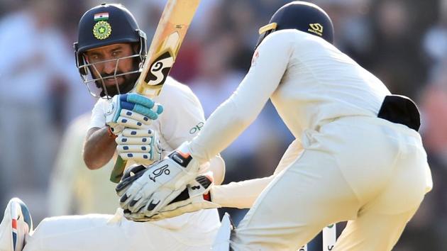Cheteshwar Pujara in action on Day 2 of the fourth Test between India and England.(AFP)