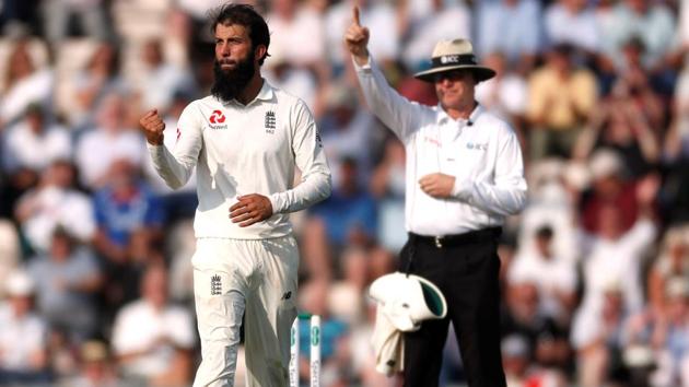 England's Moeen Ali celebrates the wicket of India's Ishant Sharma. (REUTERS)