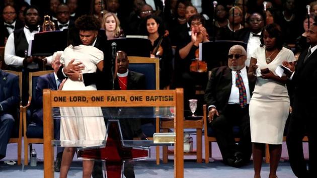 Jordan Franklin, grandson of Aretha Franklin, is comforted by Victorie Franklin as he speaks at the funeral service for Aretha Franklin t the Greater Grace Temple in Detroit, Michigan, U.S.(REUTERS)