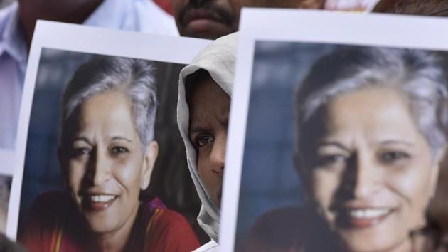 People stage a protest against the killing of Gauri Lankesh at Town hall in Bengaluru on September 6, 2017. (Arijit Sen/HT Photo) People stage a protest against the killing of Gauri Lankesh at Town hall in Bengaluru on September 6, 2017. (Arijit Sen/HT Photo)