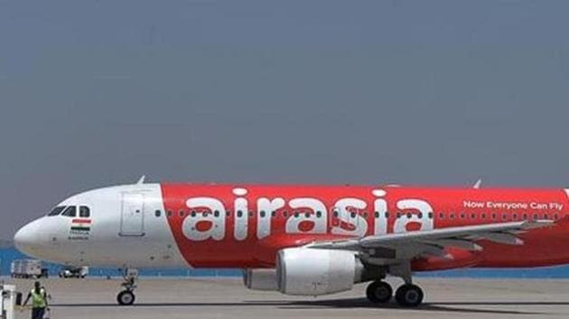 This photograph taken on March 8, 2018 shows an airplane of Air Asia, the low-cost airline headquartered in Malaysia, taxiing before take-off at the Kempe Gowda International Airport in Bangalore.(AFP File Photo) This photograph taken on March 8, 2018 shows an airplane of Air Asia, the low-cost airline headquartered in Malaysia, taxiing before take-off at the Kempe Gowda International Airport in Bangalore.(AFP File Photo)