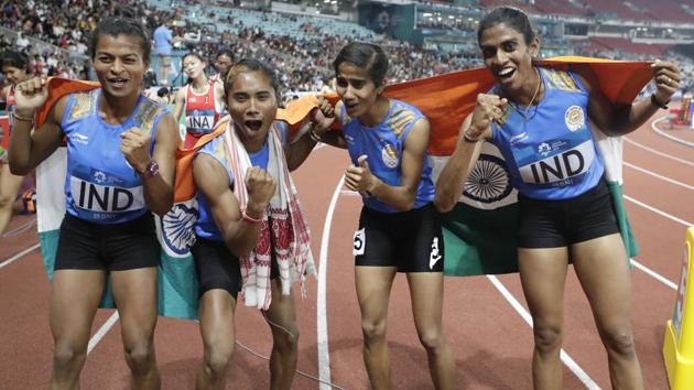 India's 4x400m relay team celebrate after winning the gold medal during the athletics competition at the 18th Asian Games in Jakarta, Indonesia.(AP Photo)