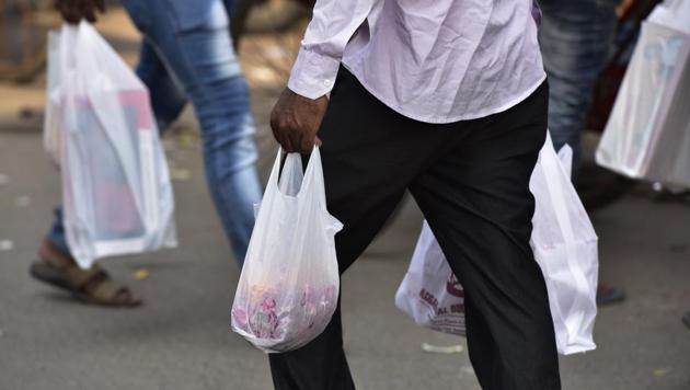 Bags less than 50 microns thick are harder to recycle and separate from trash, and often clog the drains.(Virendra Singh Gosain/HT PHOTO)