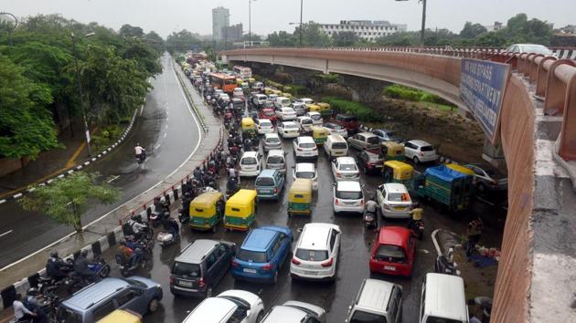 Several parts of Delhi witnessed bumper to bumper traffic like here on the Ring Road, or were bogged down due to vehicles moving slowly on waterlogged roads. (Sonu Mehta / HT Photo) Several parts of Delhi witnessed bumper to bumper traffic like here on the Ring Road, or were bogged down due to vehicles moving slowly on waterlogged roads. (Sonu Mehta / HT Photo)