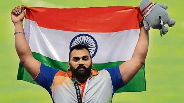 Tejinder Pal Singh Toor celebrates after winning a gold medal in shot put at Asian Games in Jakarta on August 25. (PTI) Tejinder Pal Singh Toor celebrates after winning a gold medal in shot put at Asian Games in Jakarta on August 25. (PTI)