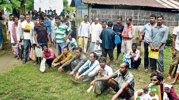 People left out in the NRC draft wait to collect forms to file appeals near a centre in Guwahati. Complaints have been pouring since the final draft did not carry names of four million people on July 30.(AP File Photo) People left out in the NRC draft wait to collect forms to file appeals near a centre in Guwahati. Complaints have been pouring since the final draft did not carry names of four million people on July 30.(AP File Photo)