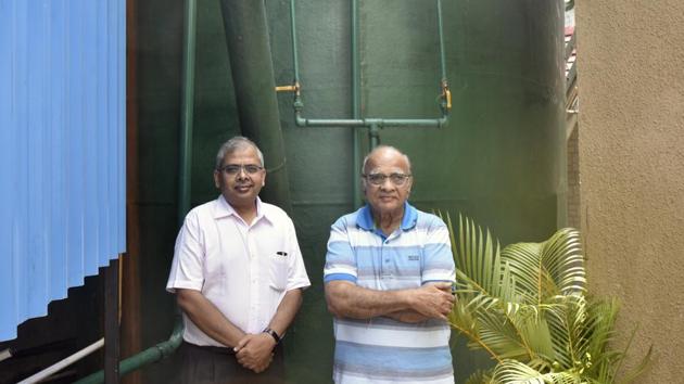 (Left) Nikhil Mehta, executive director of Club Emerald and Jashwant Mehta, the chairman of the club, near the biogas plant at Swastik Park, Chembur on Saturday.(Kunal Patil/HT Photo)