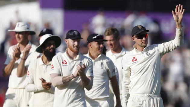 England's Joe Root, right,leads his players from the pitch after England defeated India on the fourth day of the 4th cricket test match between England and India at the Ageas Bowl in Southampton, England, Sunday, Sept. 2, 2018. (AP) England's Joe Root, right,leads his players from the pitch after England defeated India on the fourth day of the 4th cricket test match between England and India at the Ageas Bowl in Southampton, England, Sunday, Sept. 2, 2018. (AP)