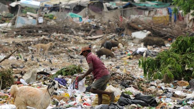 File photo of a garbage dump site in Gurugram, (HT FILE PHOTO) File photo of a garbage dump site in Gurugram, (HT FILE PHOTO)