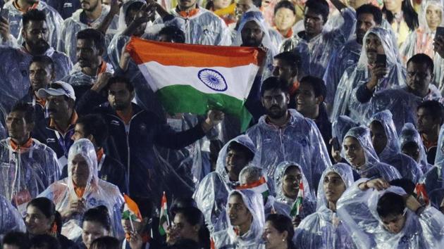 Indian athletes march into the closing ceremony for the 18th Asian Games in Jakarta. (AP)