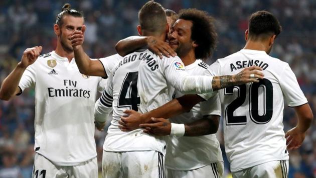 Soccer Football - La Liga Santander - Real Madrid v Leganes - Santiago Bernabeu, Madrid, Spain - September 1, 2018 Real Madrid's Sergio Ramos celebrates scoring their fourth goal with team mates (REUTERS) Soccer Football - La Liga Santander - Real Madrid v Leganes - Santiago Bernabeu, Madrid, Spain - September 1, 2018 Real Madrid's Sergio Ramos celebrates scoring their fourth goal with team mates (REUTERS)