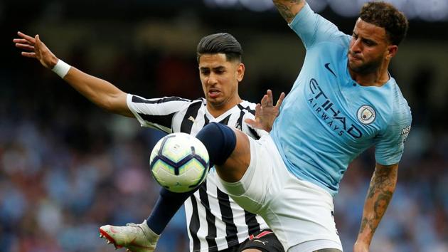 Soccer Football - Premier League - Manchester City v Newcastle United - Etihad Stadium, Manchester, Britain - September 1, 2018 Manchester City's Kyle Walker in action with Newcastle United's Ayoze Perez(REUTERS)