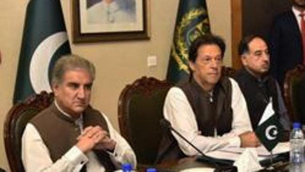 In this photo released by the Press Information Department, Pakistani Prime Minister Imran Khan, center, attends a briefing at the Foreign Ministry in Islamabad, Pakistan, Friday, Aug. 24, 2018.(AP File Photo)