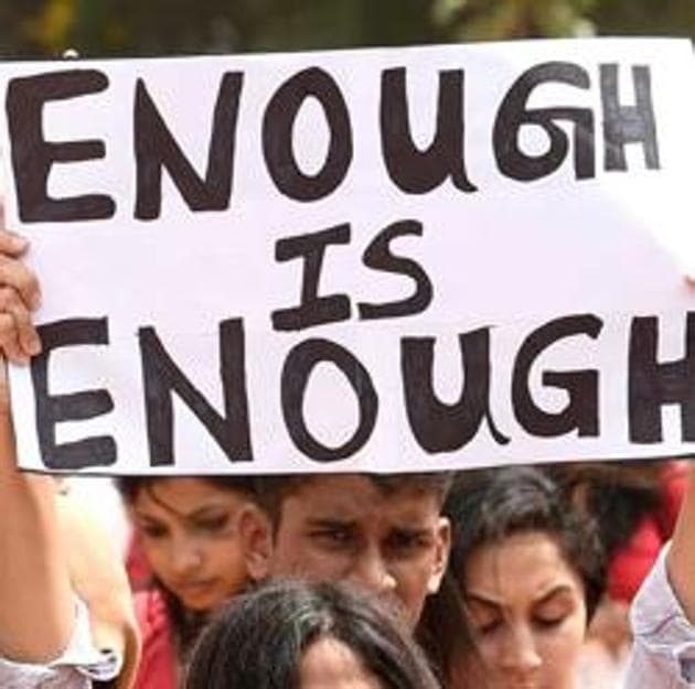 Activists hold placard at a rally in Bengaluru to protest incidents of sexual violence against women.(AFP File Photo)