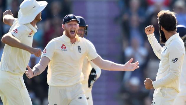 England's Moeen Ali (R) celebrates with England's Ben Stokes (C) after taking the wicket of India's Ajinkya Rahane for 21 during the fourth day of the fourth Test cricket match between England and India at the Ageas Bowl in Southampton, southwest England on September 2, 2018. (AFP) England's Moeen Ali (R) celebrates with England's Ben Stokes (C) after taking the wicket of India's Ajinkya Rahane for 21 during the fourth day of the fourth Test cricket match between England and India at the Ageas Bowl in Southampton, southwest England on September 2, 2018. (AFP)