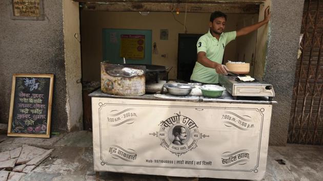 Eventually 71 businesses remained and were paired with 71 designers across the country. They rebranded their signage, posters, murals, visiting cards, bill books, menus and other material. Designs are inspired by pop culture and art, street iconography, religious imagery and vintage graphics. Abhishek Choudhury, a Delhi-based designer developed a design system for a ‘vaishno dhaba’, with a challenge to make this eatery stand out in Lado Sarai’s clutter. (Burhaan Kinu / HT Photo) 