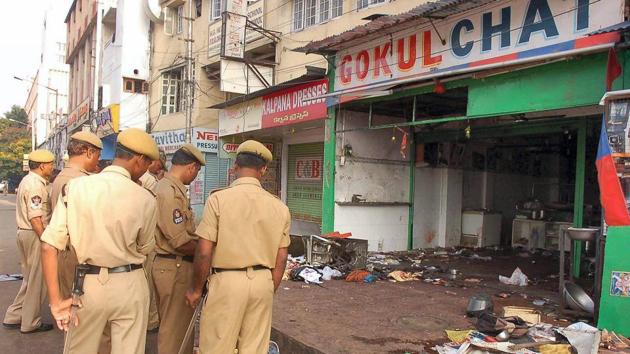 The near simultaneous blasts at the popular eatery Gokul Chat killed 32 people and left 47 injured, while 12 others died and 21 were injured at the open air theatre at Lumbini Park, a few metres away from the state secretariat in the blasts.(PTI/File Photo)