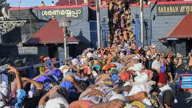 File photo of devotees at Lord Ayyappa temple in Sabarimala.(PTI) File photo of devotees at Lord Ayyappa temple in Sabarimala.(PTI)