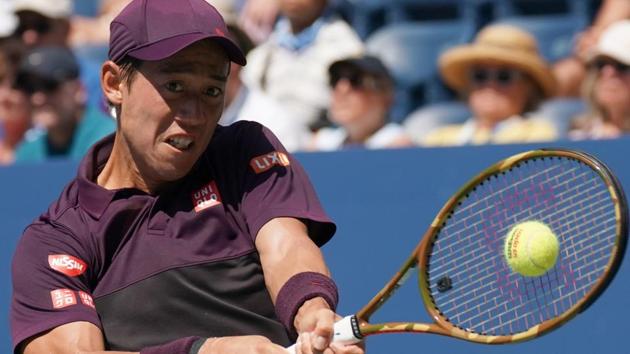 Kei Nishikori of Japan competes against Philipp Kohlschreiber of Germany during their 4th round 2018 US Open Men's Singles match.(AFP)