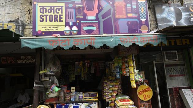 Similarly, a vegetable hawker, a ration store, an egg-seller in Karol Bagh’s Sat Nagar had new signage created for them. Kamal Store, a 50-year-old ration store, now has beautifully designed signage, a logo placed alongside distinct artistic representations of objects it sells. Kamal Kant, the store owner, said the new signage is attracting attention but wasn’t sure if it would help boost business. (Burhaan Kinu / HT Photo) 