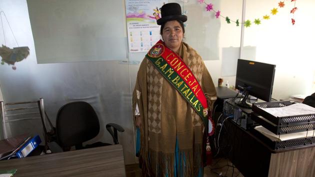 Lidia Quispe poses for photo in her sash. Awareness of violence against female politicians in the country was raised by the 2012 killing of Ancoirames Councilwoman Juana Quispe, whose body was found with signs of violence on the banks of a river in La Paz. Quispe’s death led to passage of a law against harassment and violence against women in public office. (Juan Karita / AP) Lidia Quispe poses for photo in her sash. Awareness of violence against female politicians in the country was raised by the 2012 killing of Ancoirames Councilwoman Juana Quispe, whose body was found with signs of violence on the banks of a river in La Paz. Quispe’s death led to passage of a law against harassment and violence against women in public office. (Juan Karita / AP)