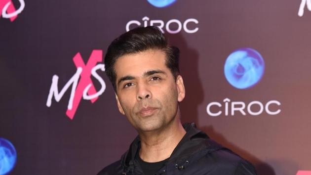 Bollywood film director-producer Karan Johar poses during the store launch of the fashion label MXS in Mumbai on September 1.(AFP)