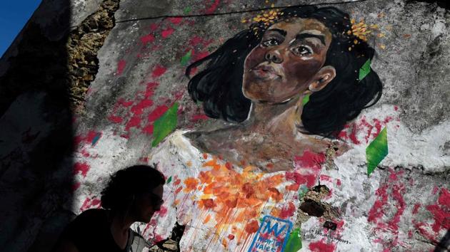 Cubist Meninas, a Menina with a Darth Vader head, another sporting the feminist slogan “Time’s Up”, a mermaid Menina with long blue hair and a scar on her breast campaigning for breast cancer, another whose face lines follow the cracks of a wall... in Canido, they come in all colours and sizes. (Miguel Riopa / AFP) Cubist Meninas, a Menina with a Darth Vader head, another sporting the feminist slogan “Time’s Up”, a mermaid Menina with long blue hair and a scar on her breast campaigning for breast cancer, another whose face lines follow the cracks of a wall... in Canido, they come in all colours and sizes. (Miguel Riopa / AFP)