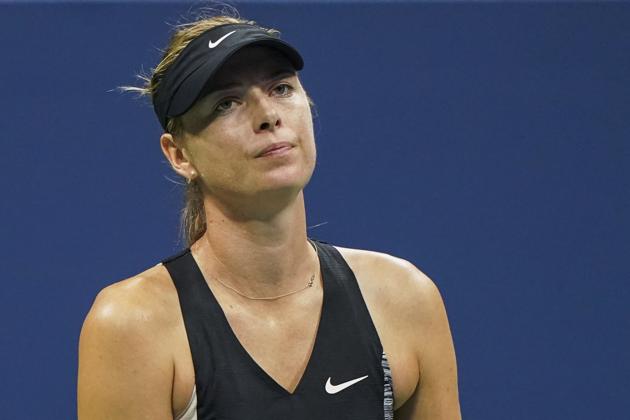 Russia's Maria Sharapova reacts after losing a point to Spain's Carla Suarez Navarro during their 2018 US Open Women's Singles tennis match at the USTA Billie Jean King National Tennis Center in New York on September 3, 2018. (AFP) Russia's Maria Sharapova reacts after losing a point to Spain's Carla Suarez Navarro during their 2018 US Open Women's Singles tennis match at the USTA Billie Jean King National Tennis Center in New York on September 3, 2018. (AFP)