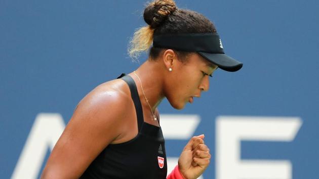 Naomi Osaka of Japan reacts during her women's singles quarter-final match against Lesia Tsurenko of Ukraine.(AFP)