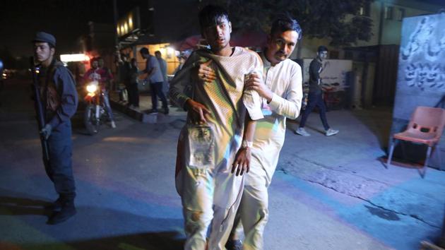 An injured boy is held up outside a hospital following a deadly attack in Kabul on September 5. (AP Photo) An injured boy is held up outside a hospital following a deadly attack in Kabul on September 5. (AP Photo)