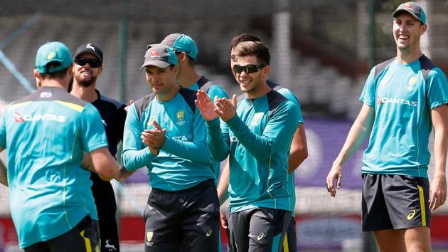 Australian cricket team captain Tim Paine and teammates during a net session.(REUTERS)