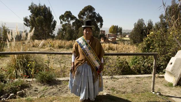 Achocalla councilwoman Mary de la Cruz beams with pride wearing her councilwoman’s sash. But then she teared up recalling how a male colleague recently punched her in the face. Few countries have advanced as quickly toward gender parity in politics as has Bolivia. But some male politicians have resisted change and women’s rights activists report a sharp increase in violence against female politicians. (Juan Karita / AP) Achocalla councilwoman Mary de la Cruz beams with pride wearing her councilwoman’s sash. But then she teared up recalling how a male colleague recently punched her in the face. Few countries have advanced as quickly toward gender parity in politics as has Bolivia. But some male politicians have resisted change and women’s rights activists report a sharp increase in violence against female politicians. (Juan Karita / AP)